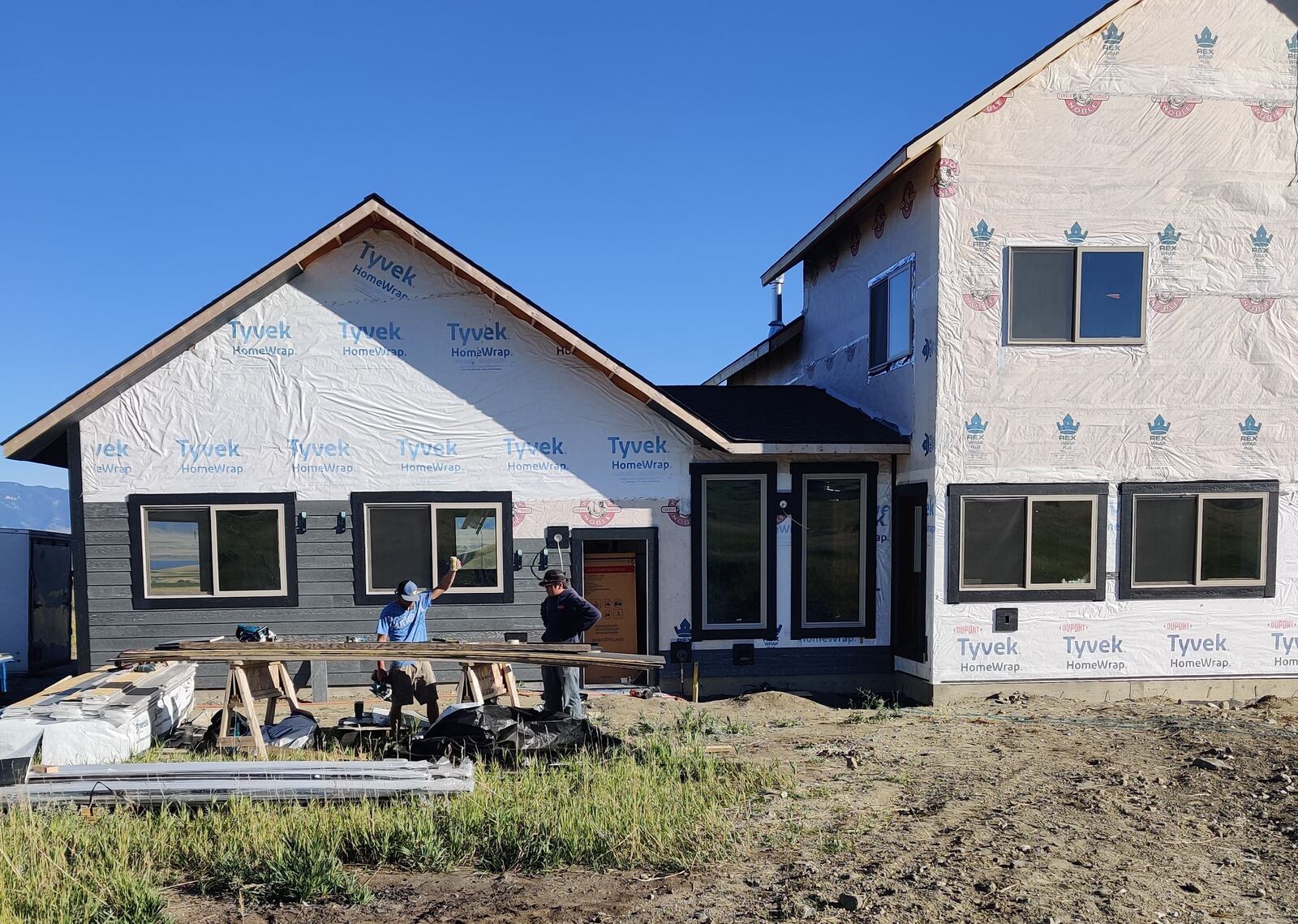 Home under construction with Tyvek wrap